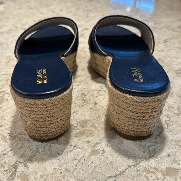 MICHAEL KORS~WOMENS~NAVY~
ROUND TOE~SLIP ON SANDALS~WITH GOLD METAL LETTERS~BR - Picture 6 of 9